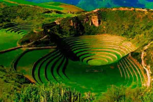 Moray Cusco Peru showing circular Inca terraces used as agricultural laboratory surrounded by Sacred Valley mountains